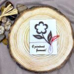 Mărțișor cu floare și mesaj de primăvară